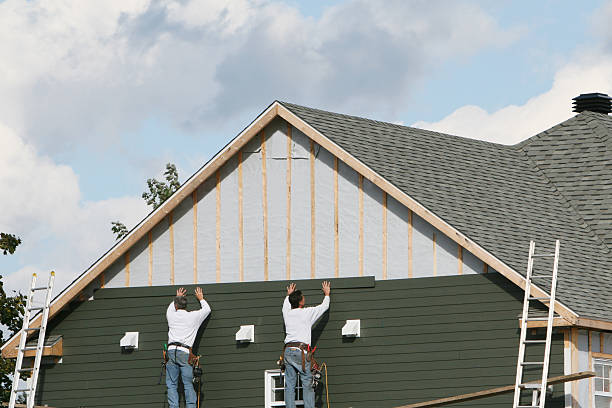 Professional Storm Damage Siding Repair technician working in Scotland, PA